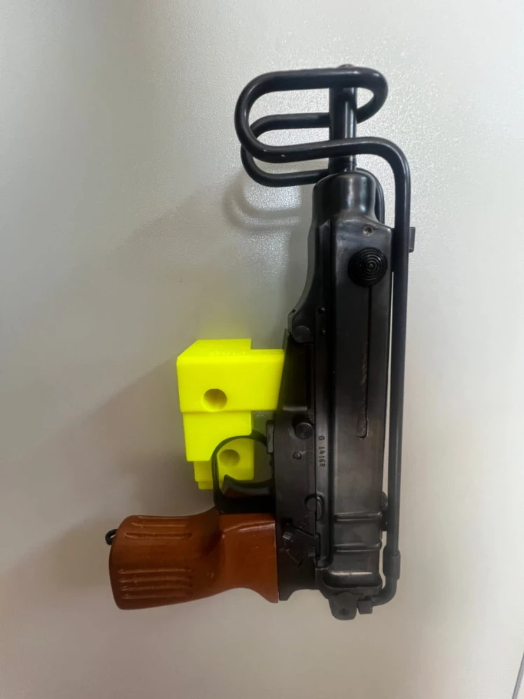 Uchwyt na broń SKORPION vz. 61 (mocowanie bokiem - wkładanie od góry w gniazdo magazynka)