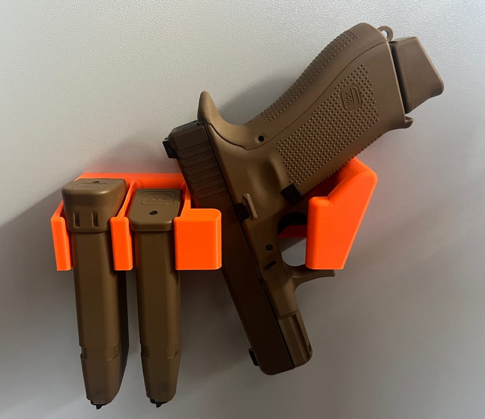 Uchwyt UNIWERSALNY na broń krótką (również z latarką/kolimatorem) i magazynek / magazynki 9mm (mocowanie BOKIEM)