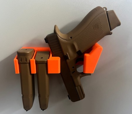 Uchwyt UNIWERSALNY na broń krótką (również z latarką/kolimatorem) i magazynek / magazynki 9mm (mocowanie BOKIEM)