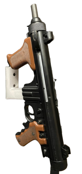 Przejdź do produktu Uchwyt / wieszak na Beretta M12 - wkładanie w gniazdo magazynka (przodem lub bokiem)